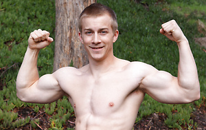 Hot jock Troy shows his sexy young body