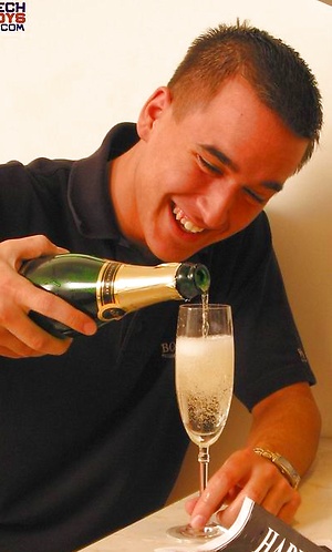 Cute lad drinks champagne and jerking off